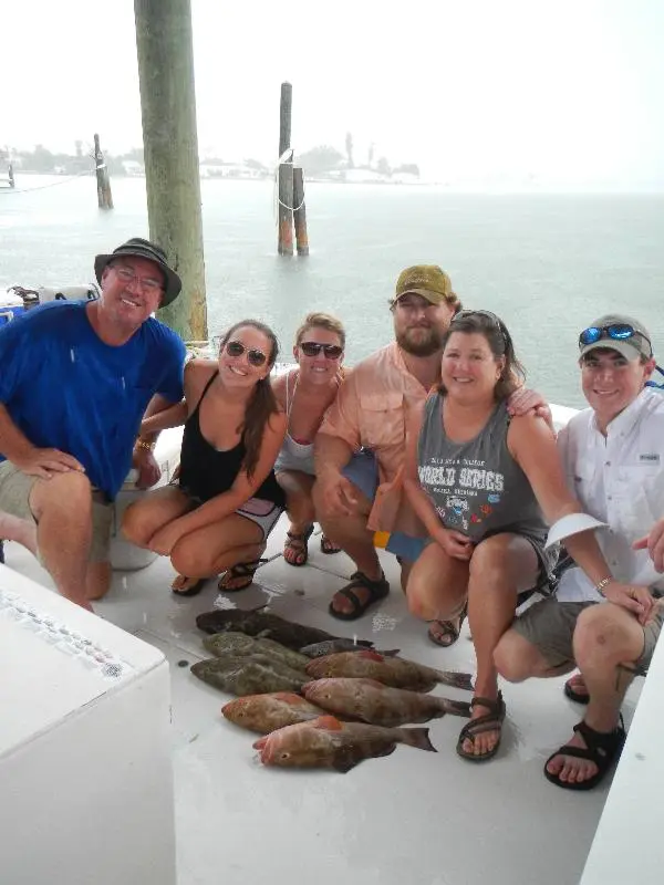 The Stubbs harvest a few Grouper in Tampa Bay