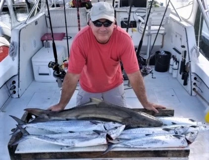 Capt. Chris with Cobia catch